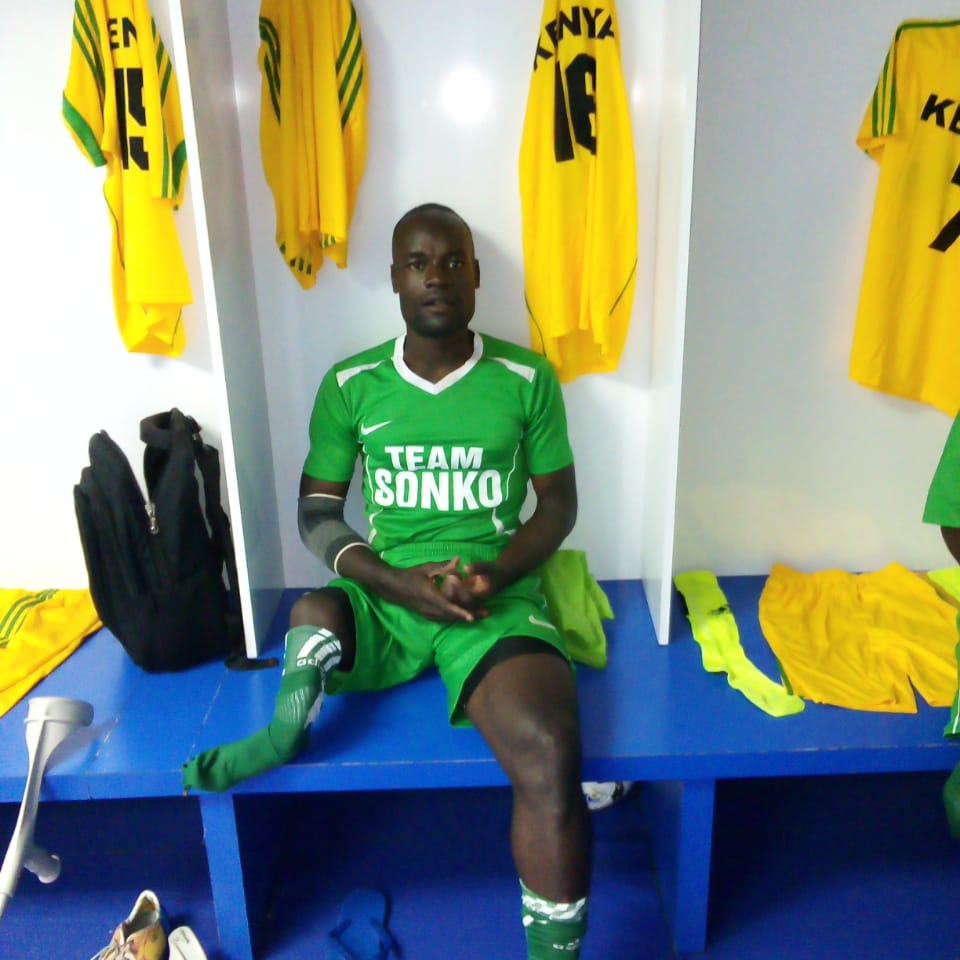 Sakwa Lumbasi seated in a locker room