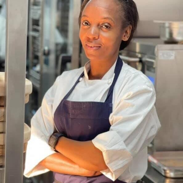 A picture of Bernice Kariuki in her chef's apron.